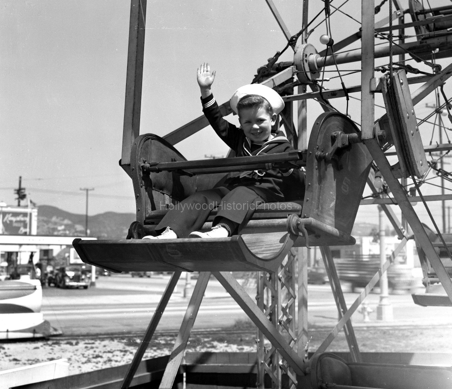 Beverly Park 1944 Little boy enjoying the Ferris Wheel wm.jpg